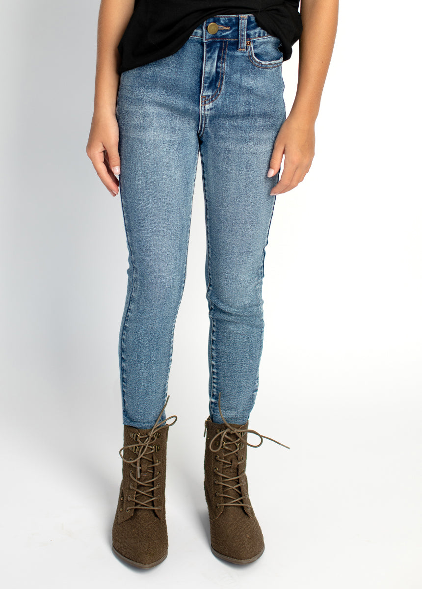 Avery Dark Distressed Skinnies in Indigo