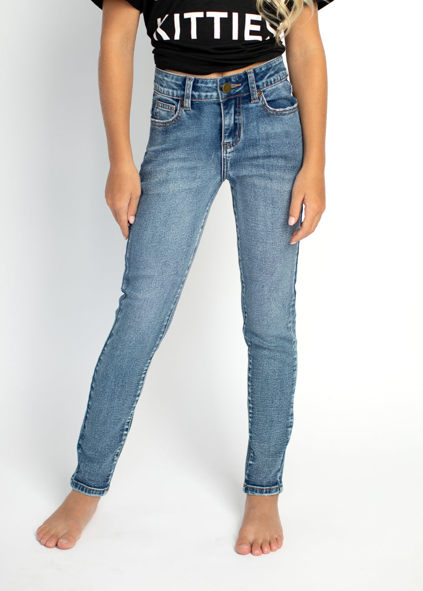 Avery Dark Distressed Skinnies in Indigo